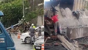 Homem e mulher são internados após estrutura de galpão desabar sobre trailer em Santos