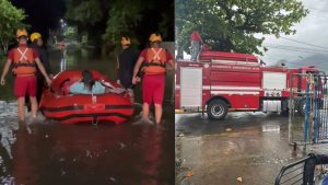 Rua alagada em Peruíbe após chuvas intensas e ventos fortes, evidenciando riscos de deslizamento na cidade.